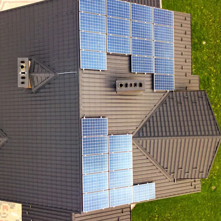 aerial-view-rural-private-house-with-solar-photovoltaic-panels-producing-clean-electricity-roof-